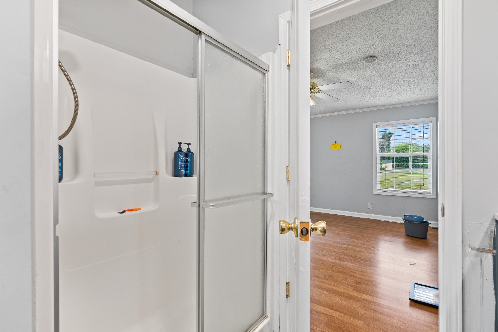 6842 Williams Road Cross Plains, TN 37049 - Photo 37 of 56 a bathroom with a tub and shower