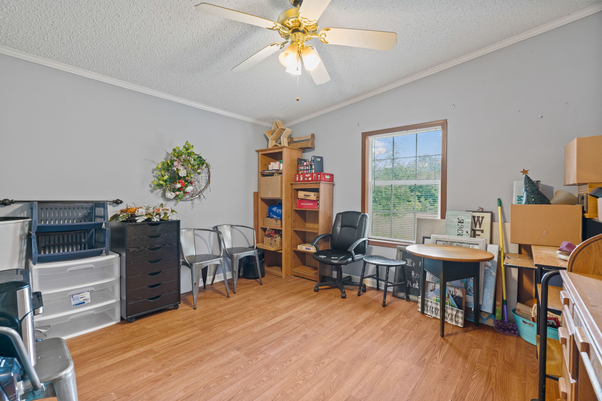 6842 Williams Road Cross Plains, TN 37049 - Photo 43 of 56 a view of a workspace with furniture and a window