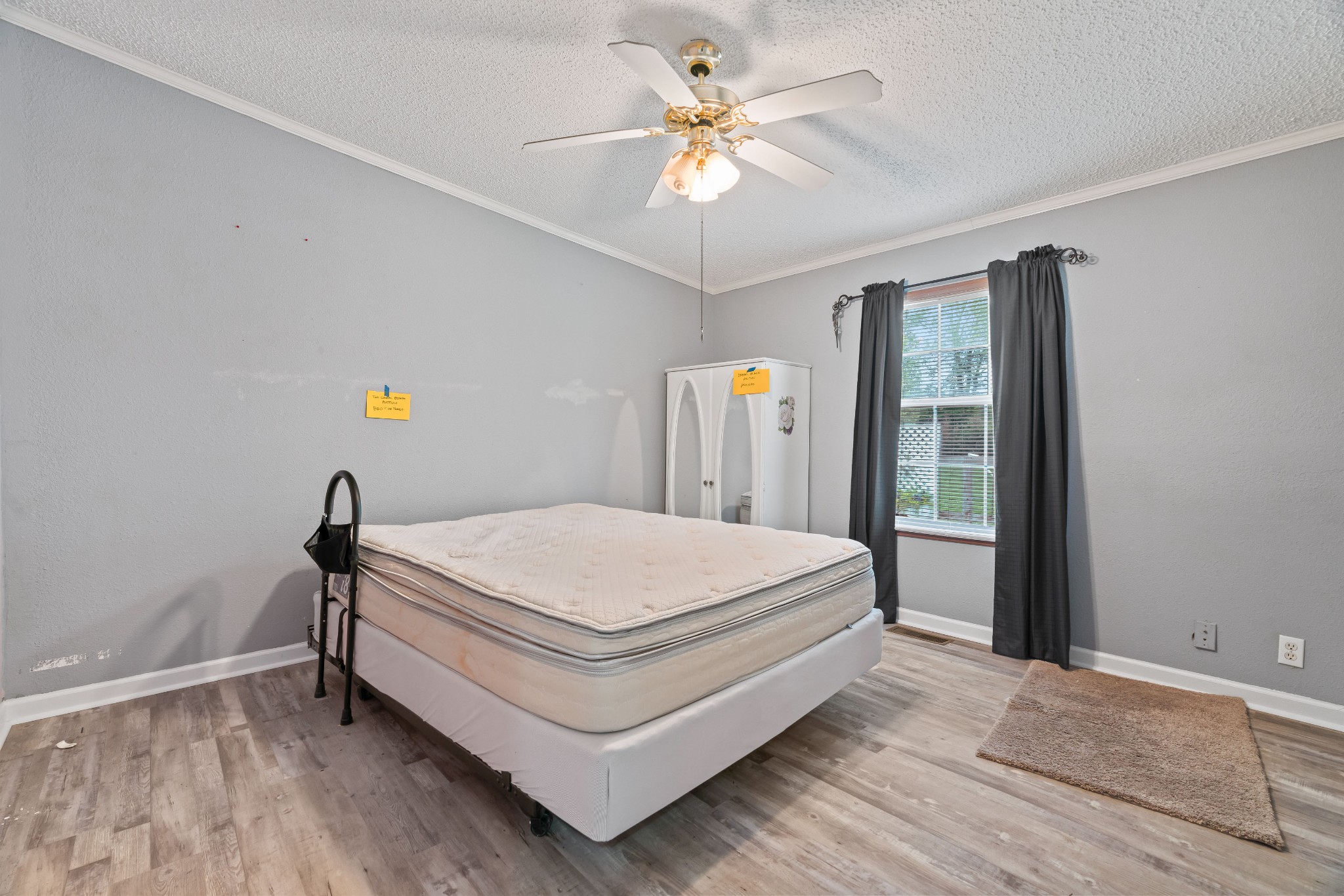 6842 Williams Road Cross Plains, TN 37049 - Photo 44 of 56 a bed sitting in a bedroom next to a window