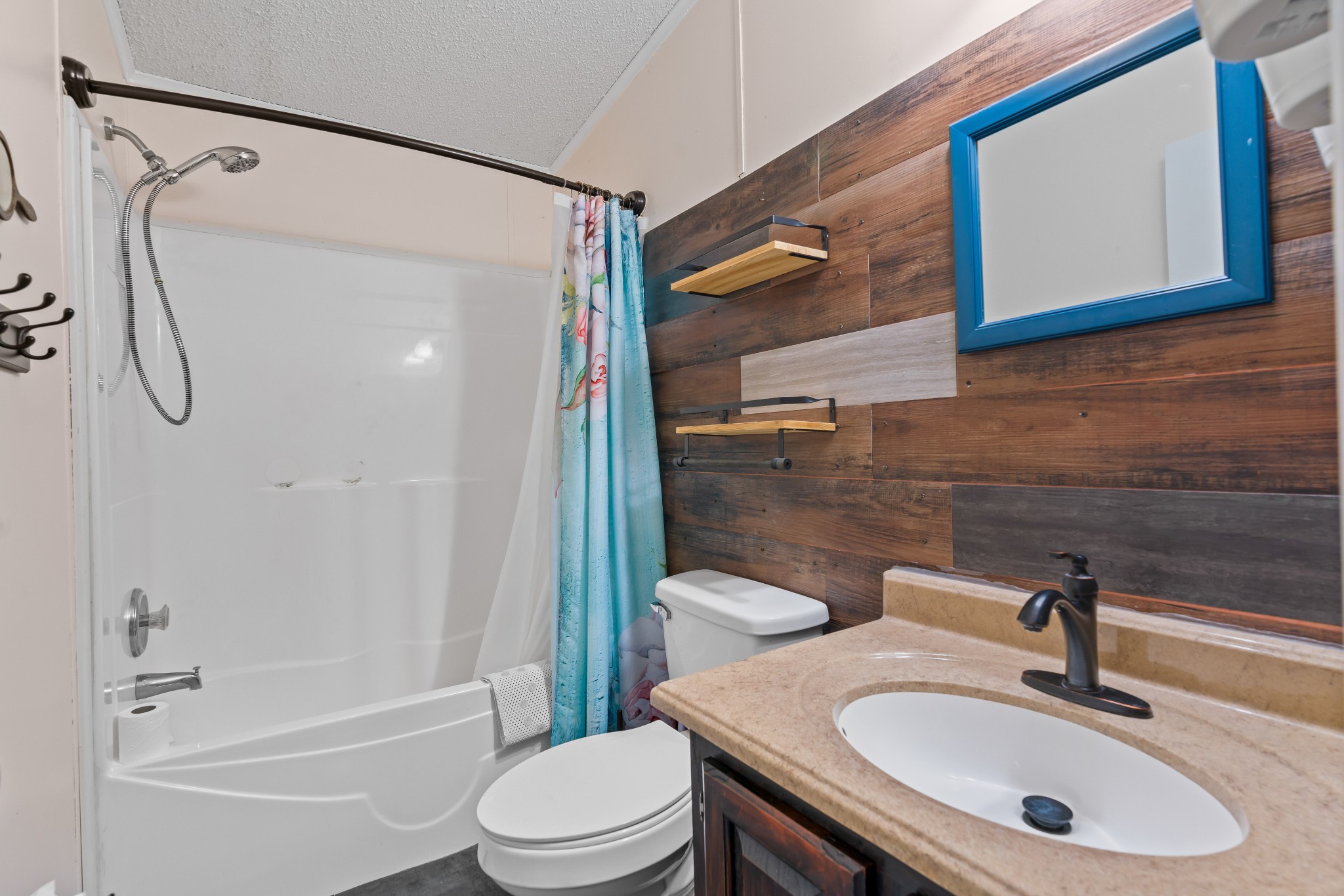 6842 Williams Road Cross Plains, TN 37049 - Photo 46 of 56 a bathroom with a sink toilet and shower