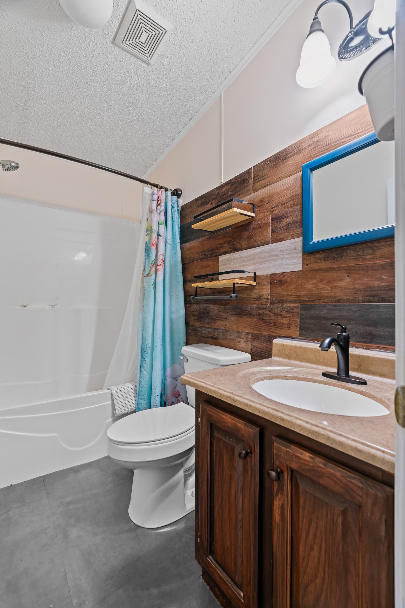 6842 Williams Road Cross Plains, TN 37049 - Photo 47 of 56 a bathroom with a sink a toilet and shower