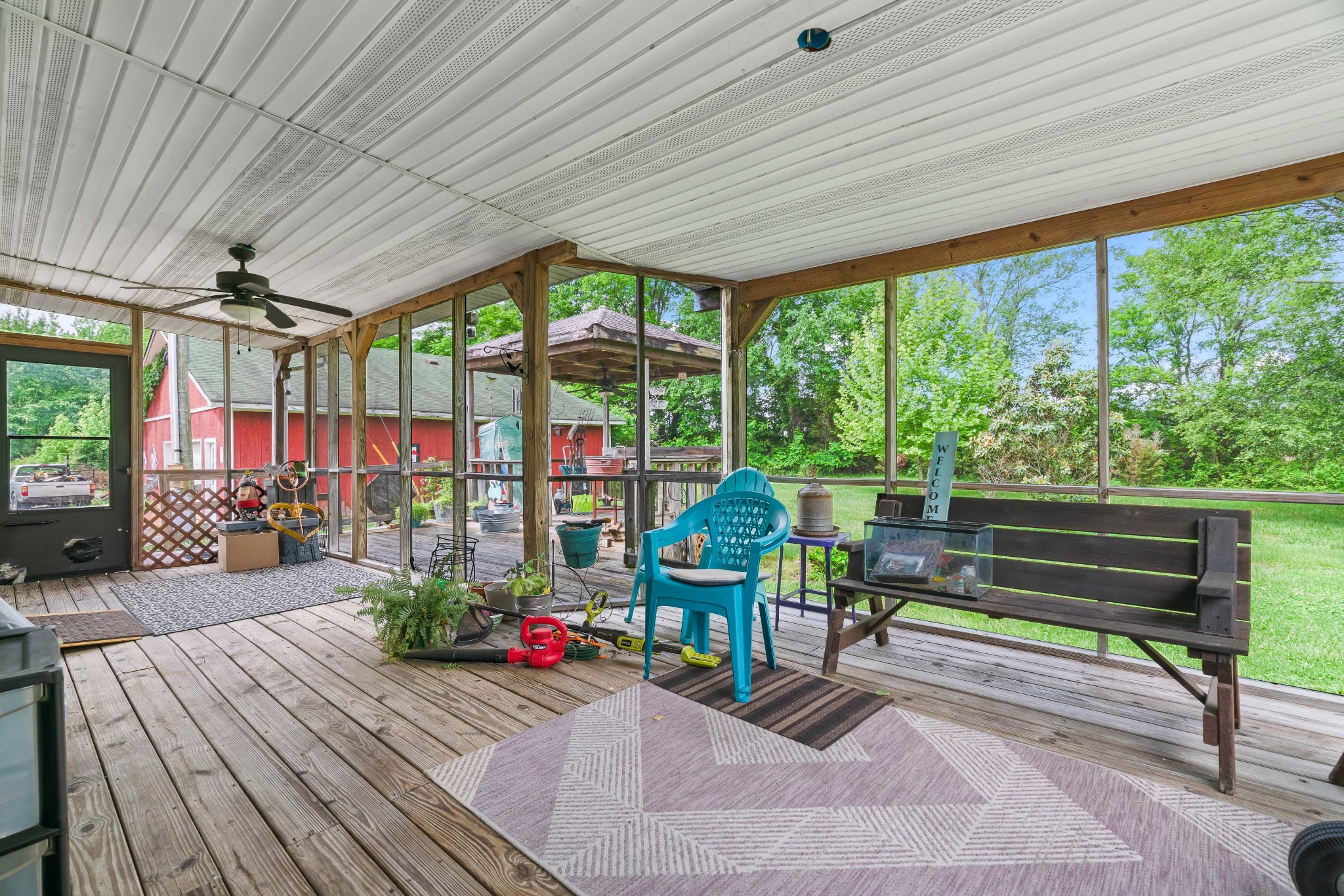 6842 Williams Road Cross Plains, TN 37049 - Photo 48 of 56 a room with lots of furniture and a wooden floor