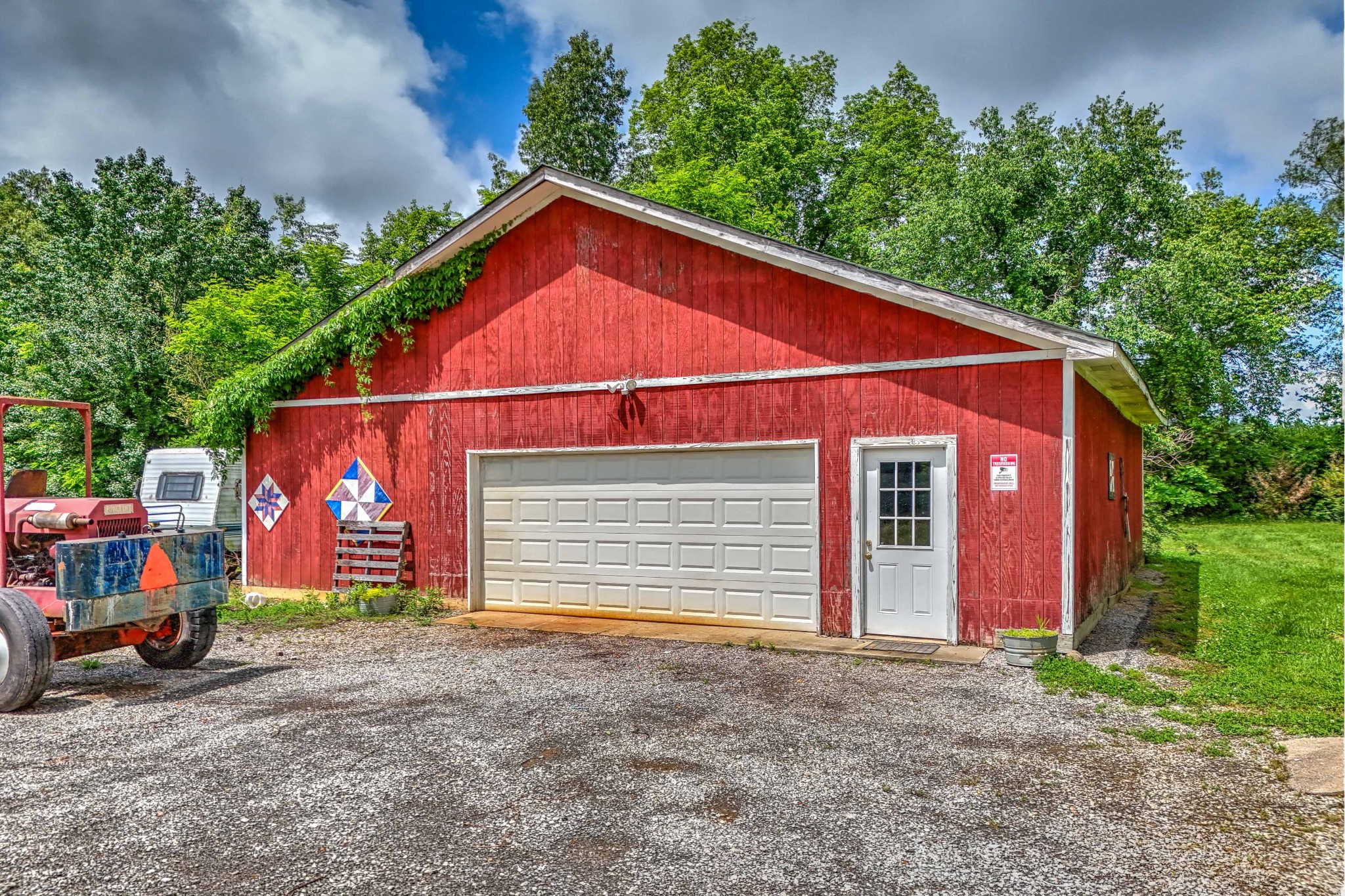 6842 Williams Road Cross Plains, TN 37049 - Photo 5 of 56 a front view of house with yard and trees