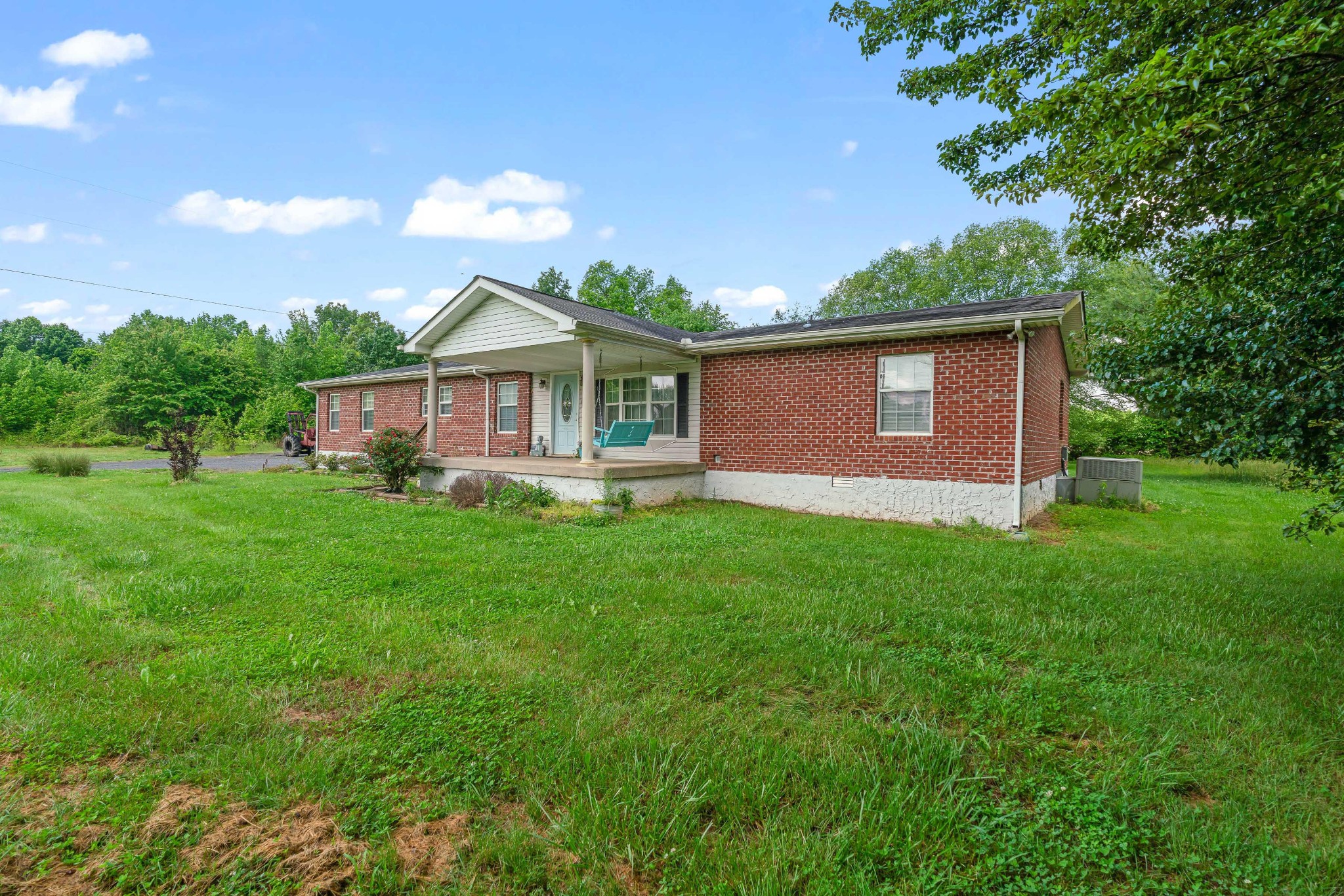 6842 Williams Road Cross Plains, TN 37049 - Photo 55 of 56 a front view of house with yard and green space