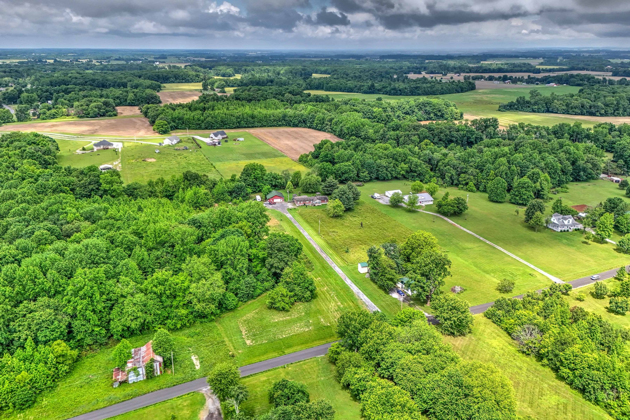 6842 Williams Road Cross Plains, TN 37049 - Photo 7 of 56 an aerial view of a houses with outdoor space and a lake view