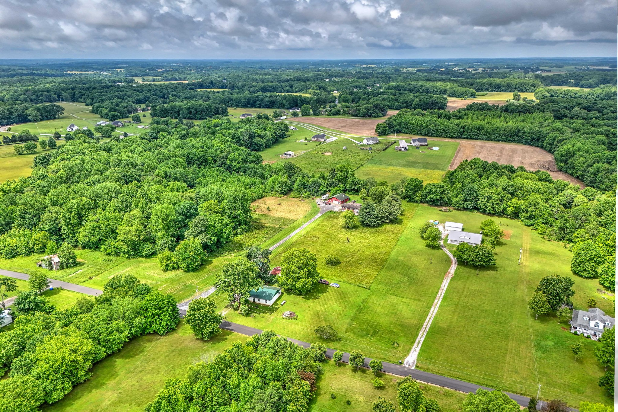 6842 Williams Road Cross Plains, TN 37049 - Photo 8 of 56 a view of a garden with an outdoor space