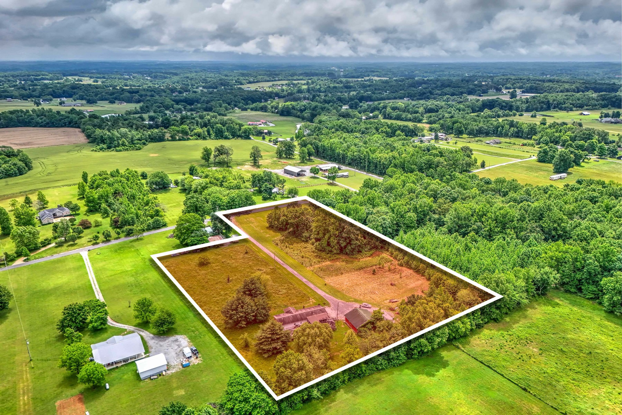 6842 Williams Road Cross Plains, TN 37049 - Photo 10 of 56 an aerial view of a residential houses with city view