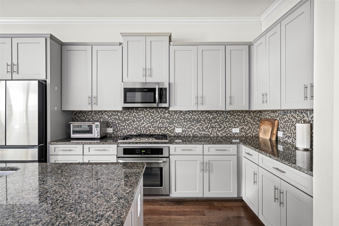 8923 Highgate Lane Houston, TX 77080 - Photo 4 of 23 Generous storage throughout, perfect for all your culinary needs. The Samsung Smart Fridge is a recent upgrade.
