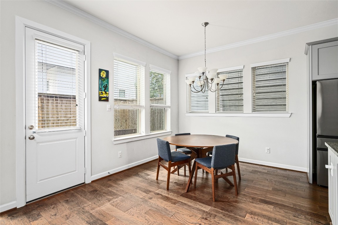 8923 Highgate Lane Houston, TX 77080 - Photo 6 of 23 Past the dining area, you'll find the access to the backyard.