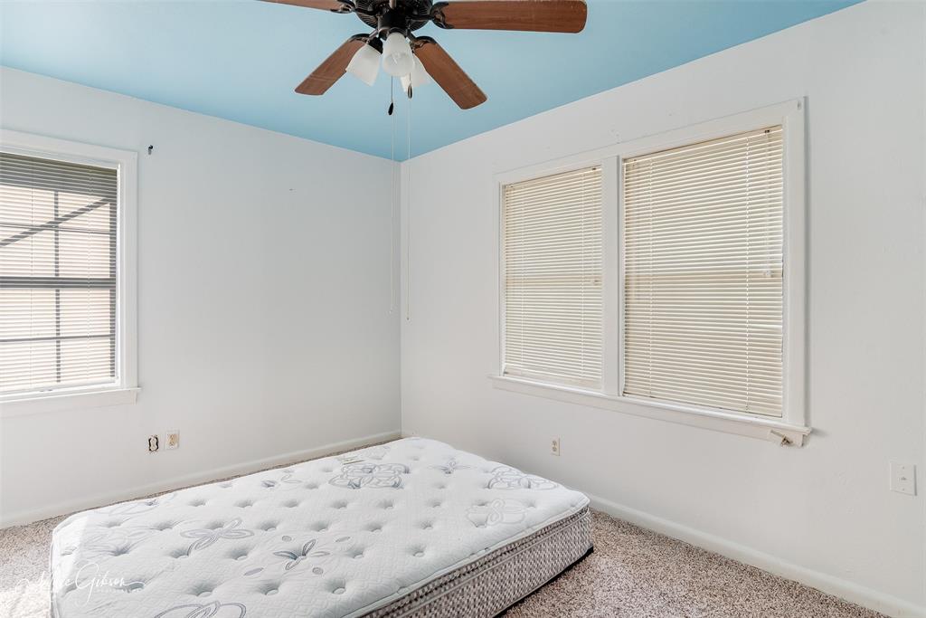 3109 Gorton Road Shreveport, LA 71119 - Photo 17 of 20 a bedroom with a bed and a window