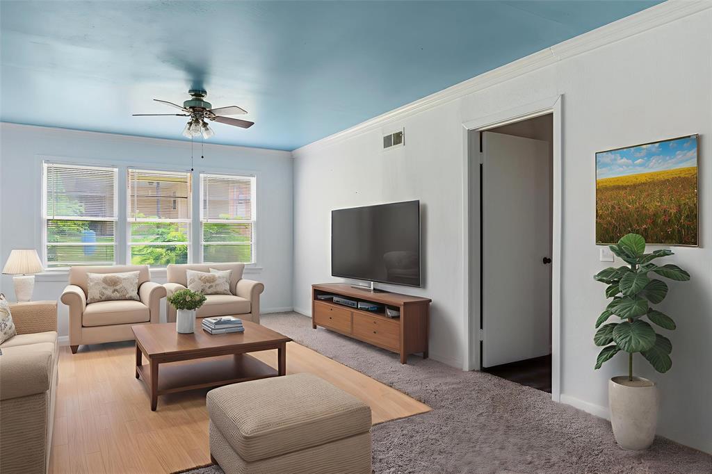 3109 Gorton Road Shreveport, LA 71119 - Photo 2 of 20 a living room with furniture and a flat screen tv