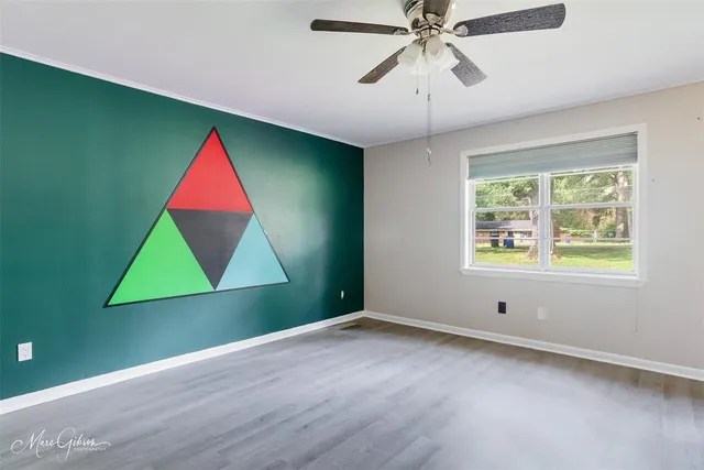 a view of a room that has a large window