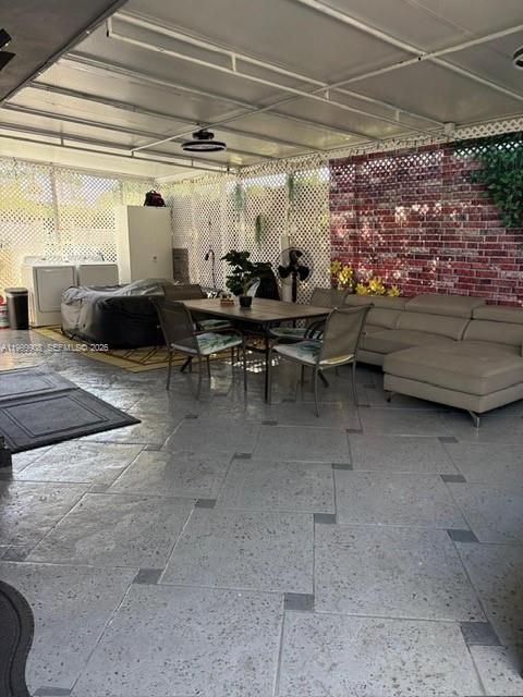 1394 West 30th Street Hialeah, FL 33012 - Photo 20 of 21 a living room with furniture a rug and a window