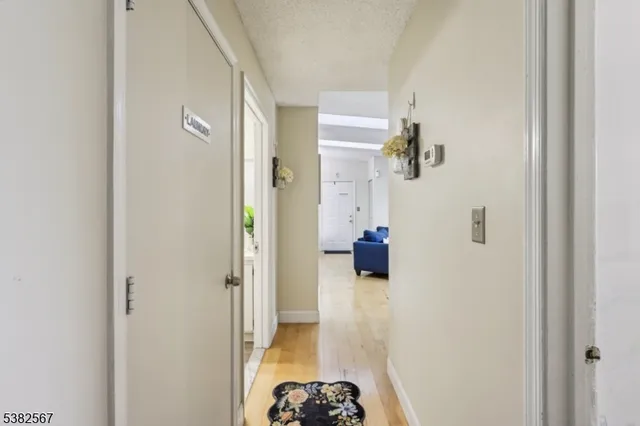 a bathroom with a sink toilet and a mirror