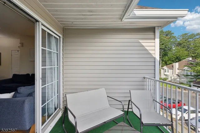 a view of a chairs on the roof deck