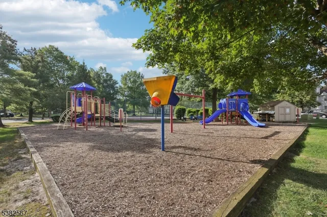 an outdoor space with patio and lake view