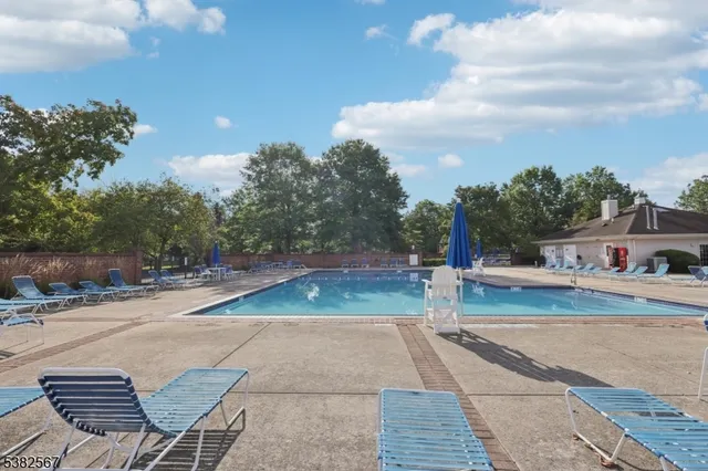 a view of a big yard in front of a brick building