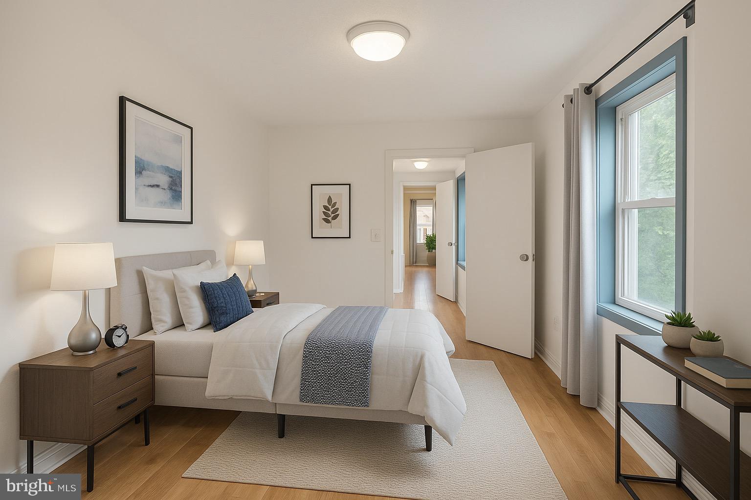 a bedroom with a bed and a night stand