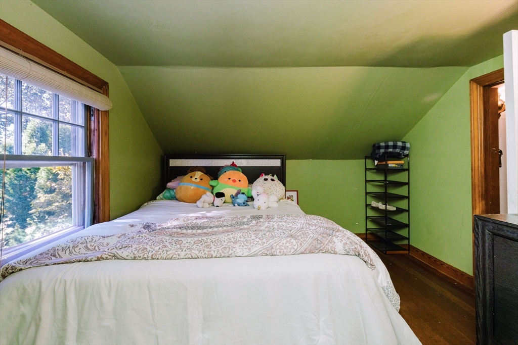 75 Randolph Avenue Tiverton, RI 02878 - Photo 16 of 22 a bedroom with a bed and a window
