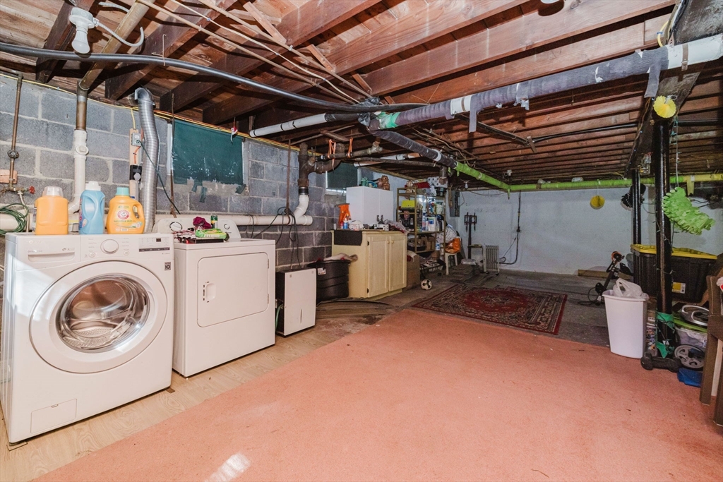 75 Randolph Avenue Tiverton, RI 02878 - Photo 20 of 22 a utility room with dryer and washer