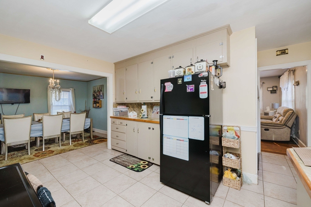 75 Randolph Avenue Tiverton, RI 02878 - Photo 10 of 22 a view of kitchen center island and living room view