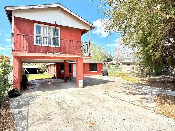 a view of a house with a patio