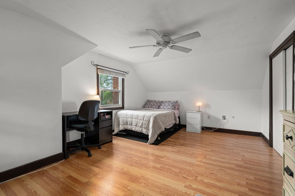 9 Laurel Lane Bellingham, MA 02019 - Photo 27 of 30 a bedroom with a bed and a window
