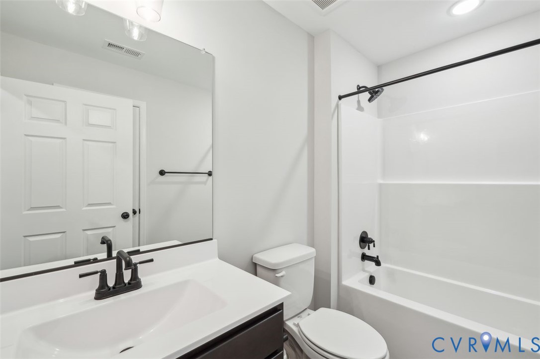 Lot 53 Wendenburg Circle, Unit LOT 53 Aylett, VA 23009 - Photo 12 of 24 a bathroom with a sink toilet and shower
