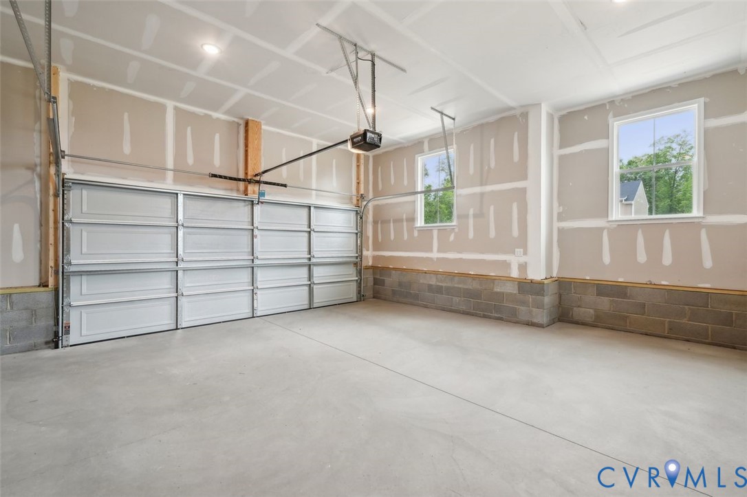 Lot 53 Wendenburg Circle, Unit LOT 53 Aylett, VA 23009 - Photo 23 of 24 a view of an empty room with windows