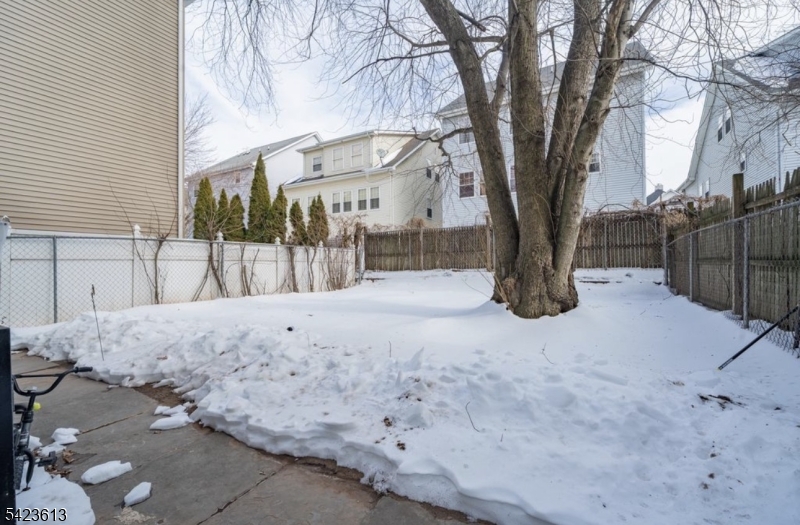626 South 20th Street, Unit 3 Newark, NJ 07103 - Photo 12 of 13 a view of a yard covered in snow