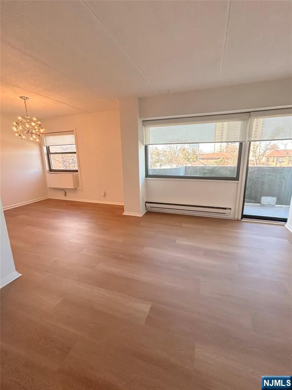 1600 Center Avenue, Unit 5A Fort Lee, NJ 07024 - Photo 2 of 10 an empty room with windows