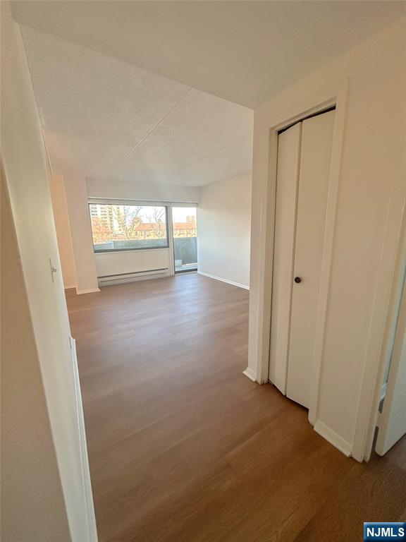 1600 Center Avenue, Unit 5A Fort Lee, NJ 07024 - Photo 8 of 10 a view of an empty room and window