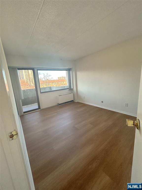 1600 Center Avenue, Unit 5A Fort Lee, NJ 07024 - Photo 9 of 10 an empty room with windows