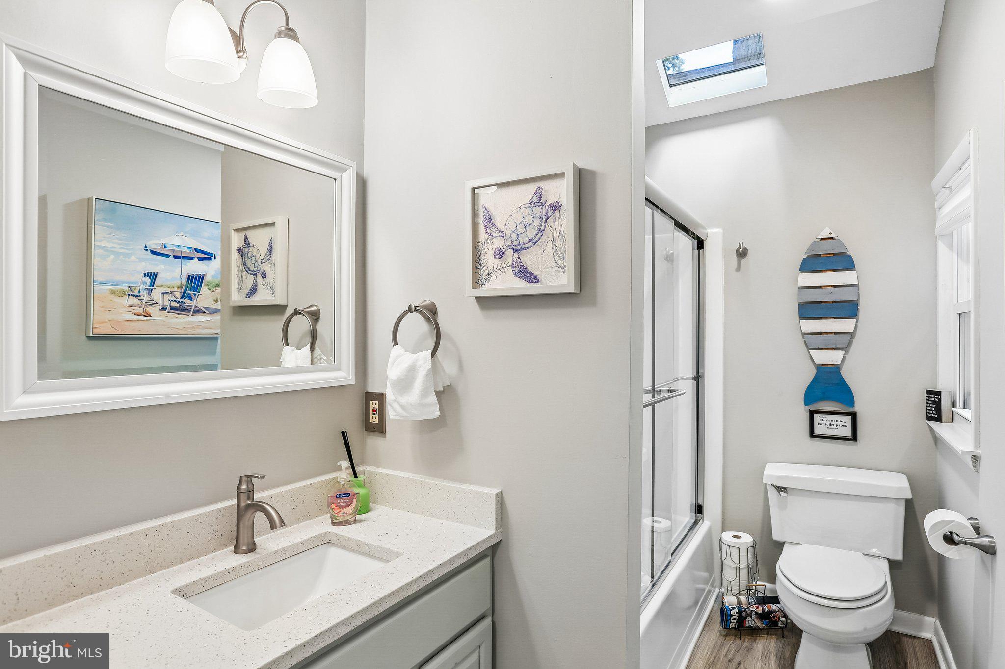275 Gibson Road Pasadena, MD 21122 - Photo 26 of 59 Coastal charm in a modern bath.