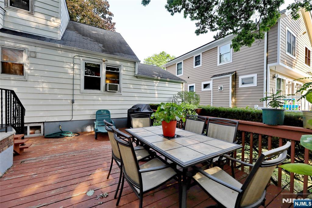 136 Elm Street Cresskill, NJ 07626 - Photo 17 of 24 a view of a patio with furniture