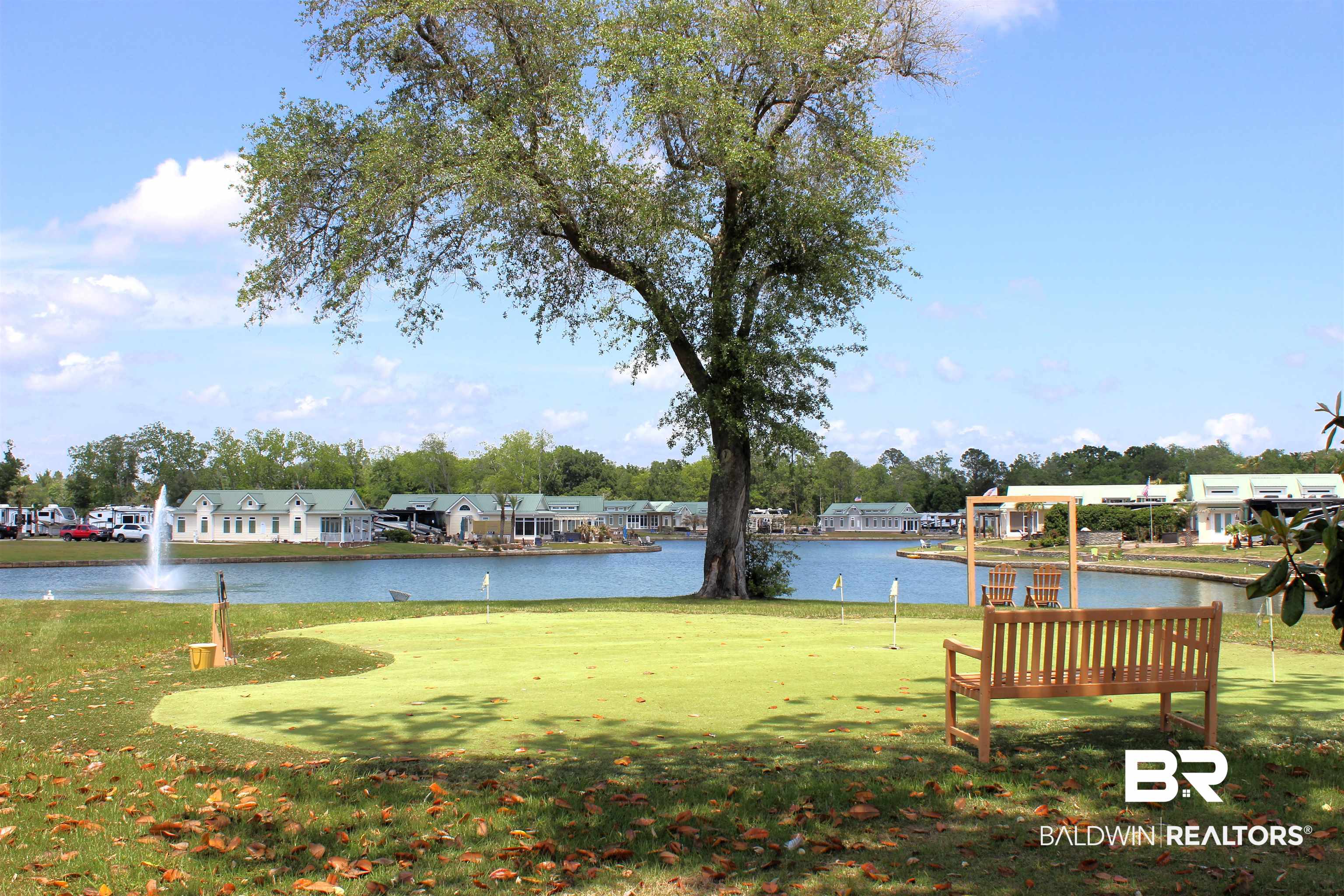 12451 Gateway Drive Elberta, AL 36530 - Photo 41 of 47 View of grassy yard with a water view and a putting green