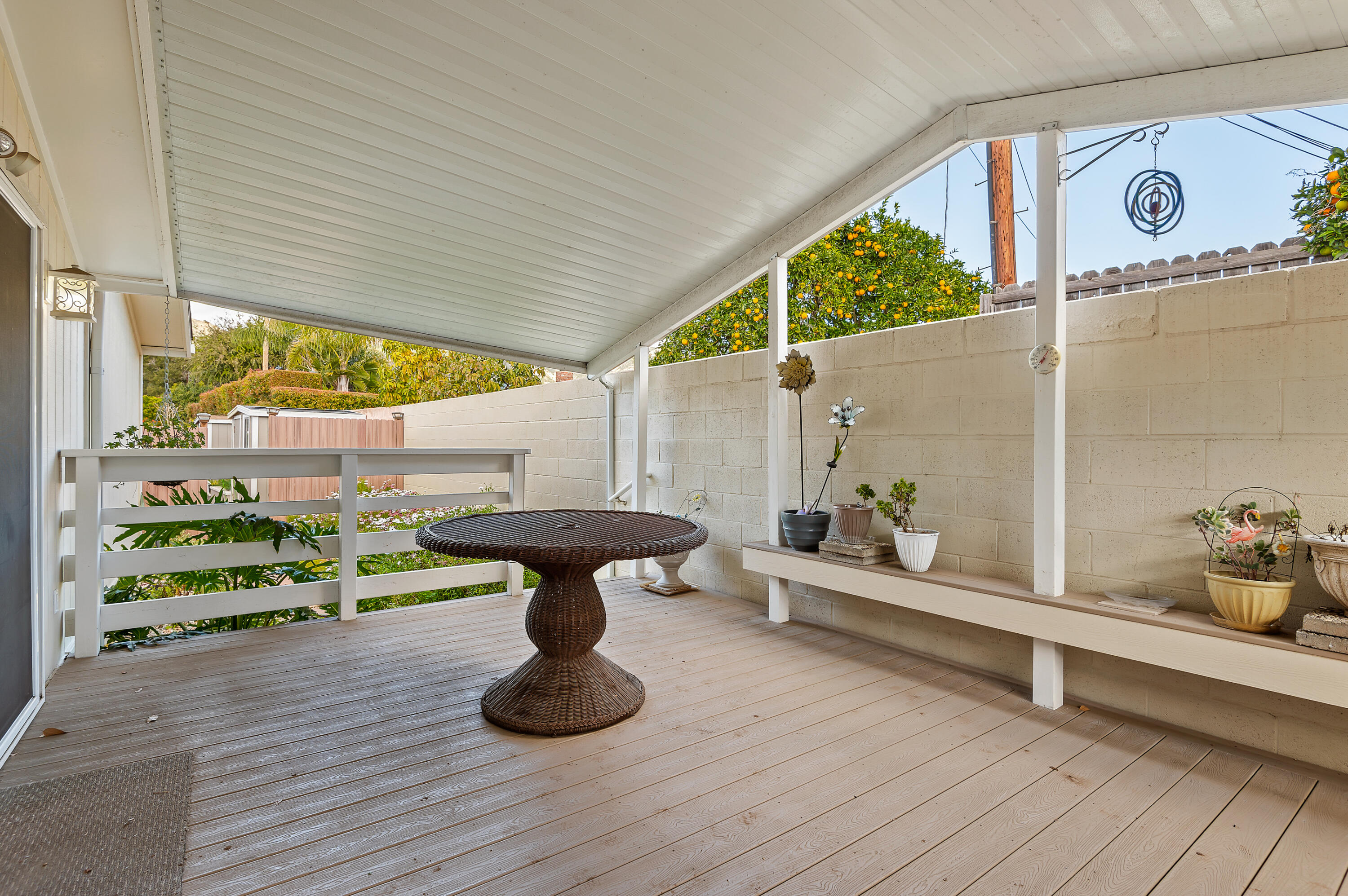 340 Old Mill Road, Unit SPC 16 Santa Barbara, CA 93110 - Photo 18 of 28 a room with lots of wooden furniture and a porch