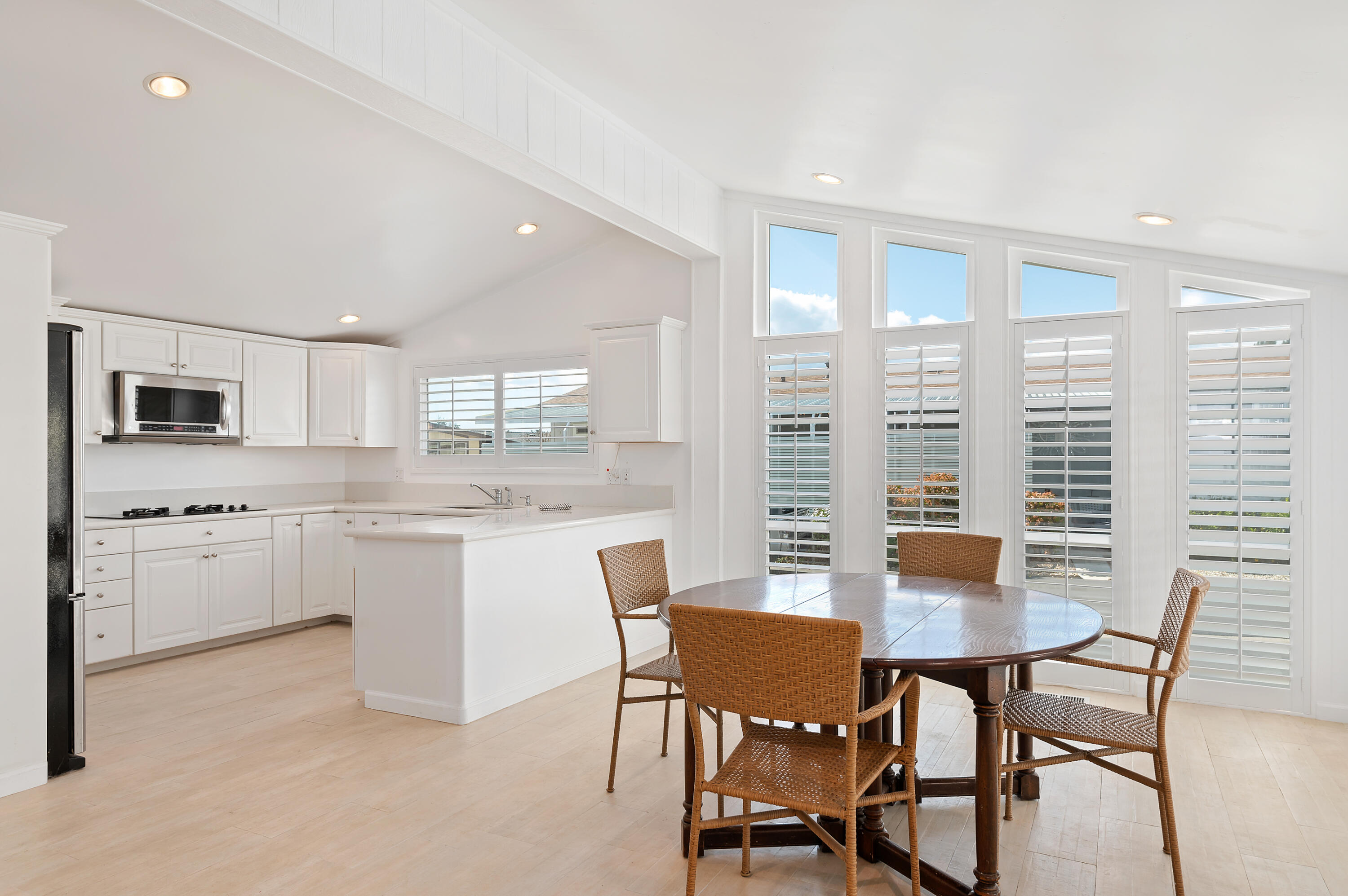 340 Old Mill Road, Unit SPC 16 Santa Barbara, CA 93110 - Photo 7 of 28 a kitchen with white cabinets and sink