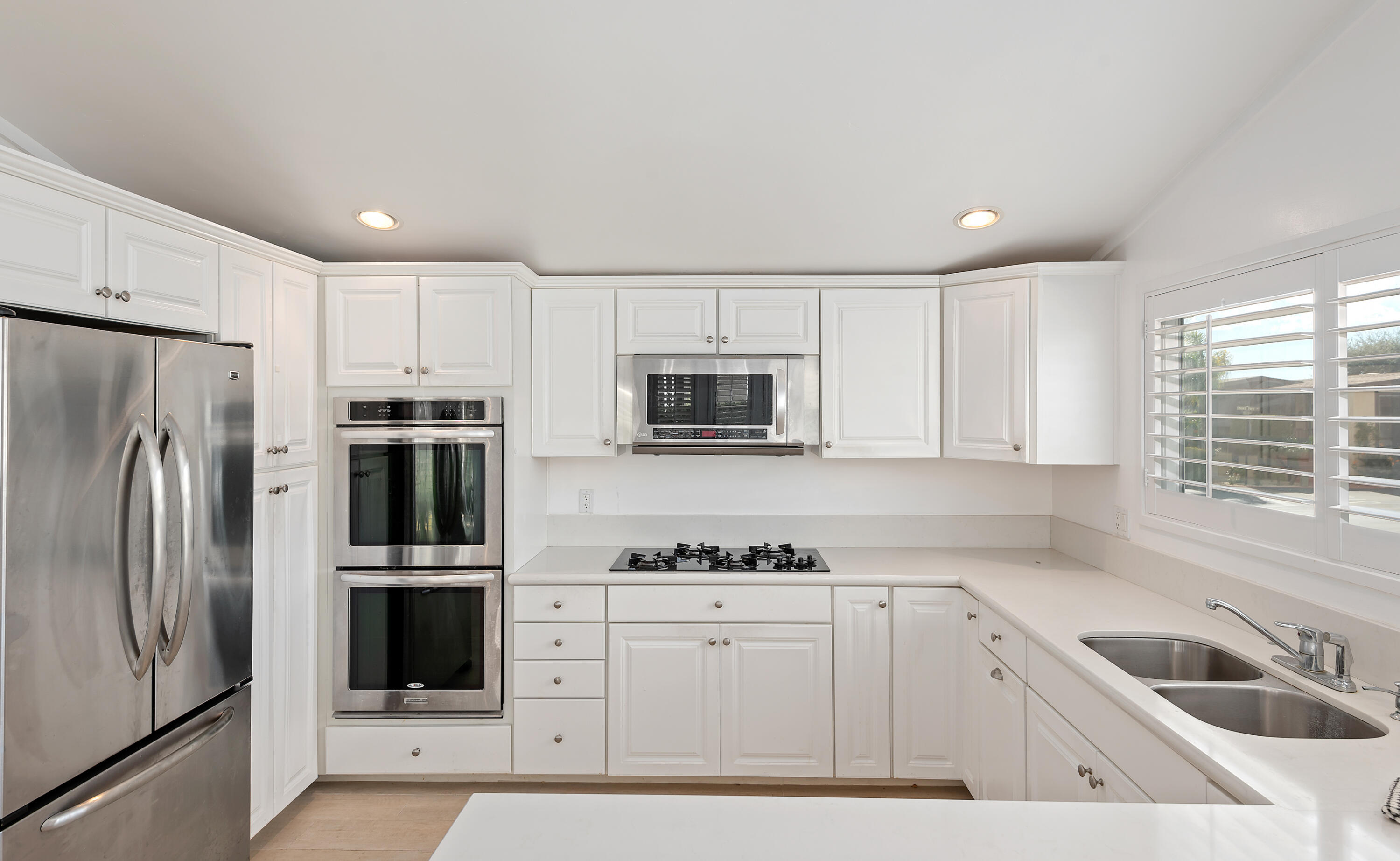 340 Old Mill Road, Unit SPC 16 Santa Barbara, CA 93110 - Photo 10 of 28 a kitchen with stainless steel appliances granite countertop a refrigerator sink and stove