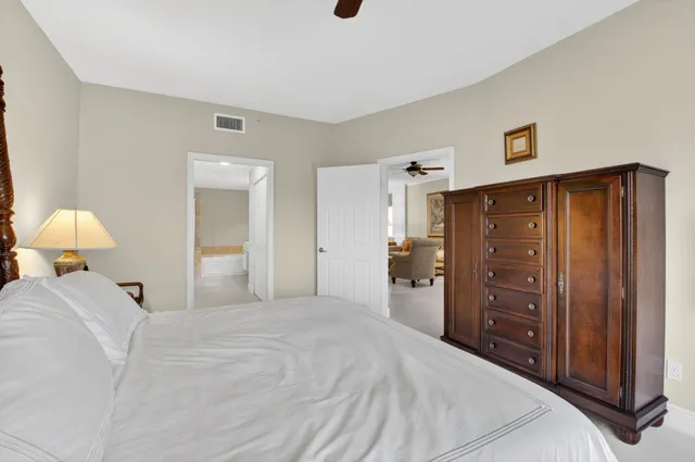 a bedroom with a bed and a closet