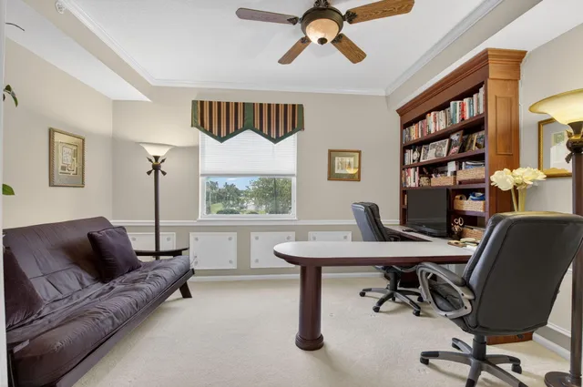 a work room with furniture and a window