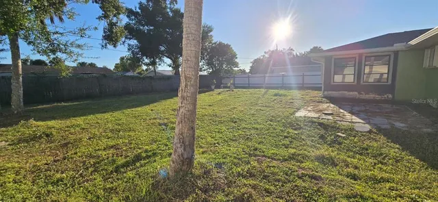 a view of a house with a garden