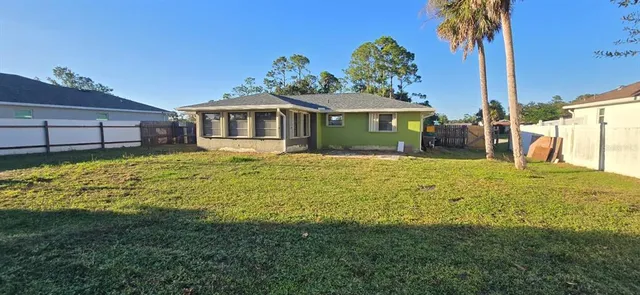 a view of a house with a big yard
