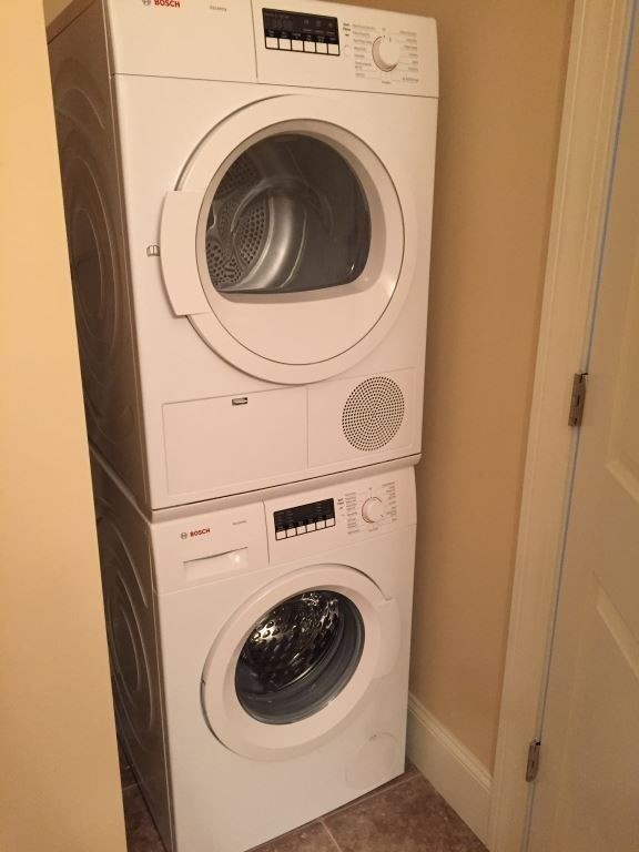 55 Green Street, Unit D168 Clinton, MA 01510 - Photo 10 of 18 a utility room with dryer and washer