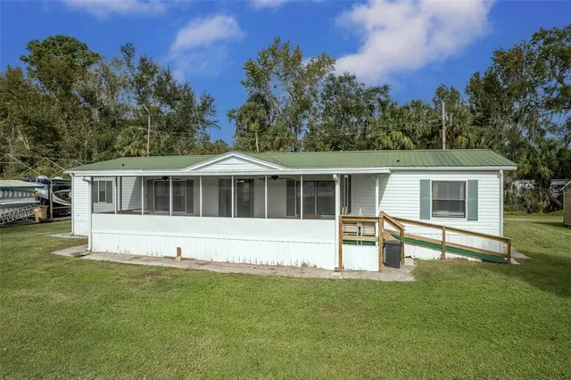 $299,000 | 25836 Manhattan Lane, Astor, FL 32102