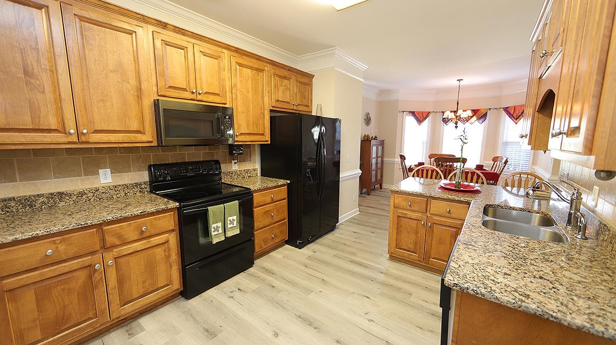 67 Jetherage Drive Willow Spring, NC 27592 - Photo 8 of 36 Functional design - good cabinet space - refrigerator does convey