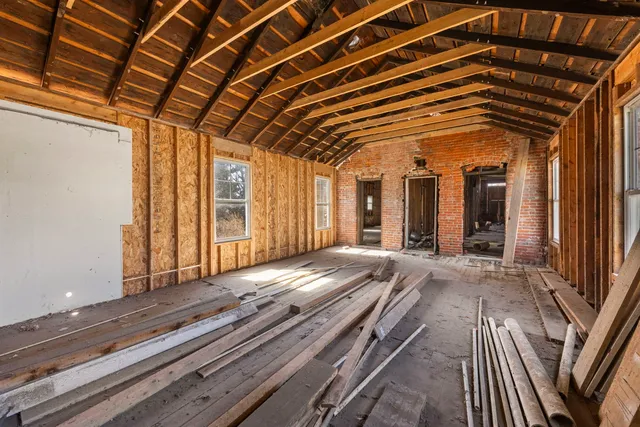 a view of backyard with large window