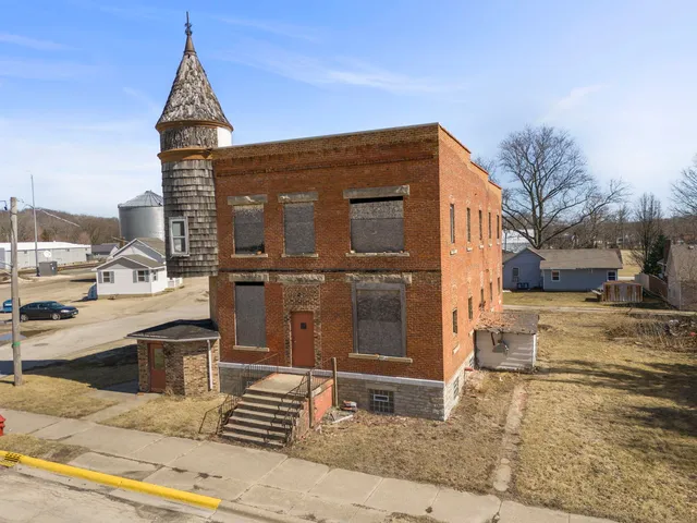 a front view of a house with parking