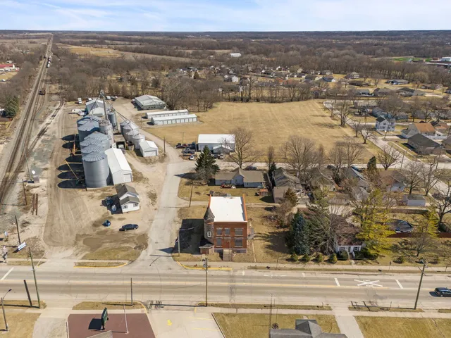 an aerial view of a city with ocean view