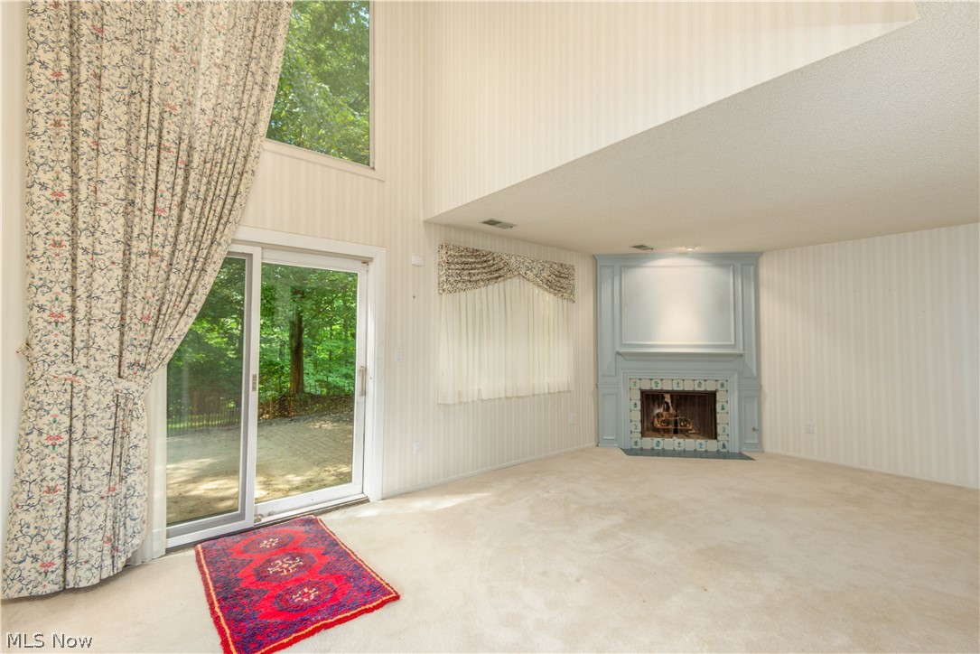 742 Hampton Ridge Drive Akron, OH 44313 - Photo 9 of 26 Living Room Fireplace & Slider